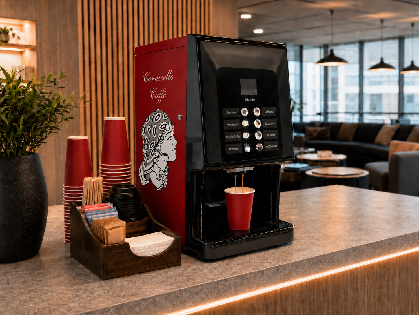 Cornicello Caffe red espresso machine on a marble counter